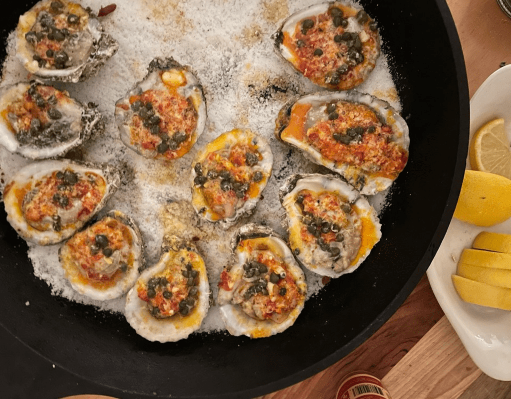 A pan of fresh and ready-to-eat oysters