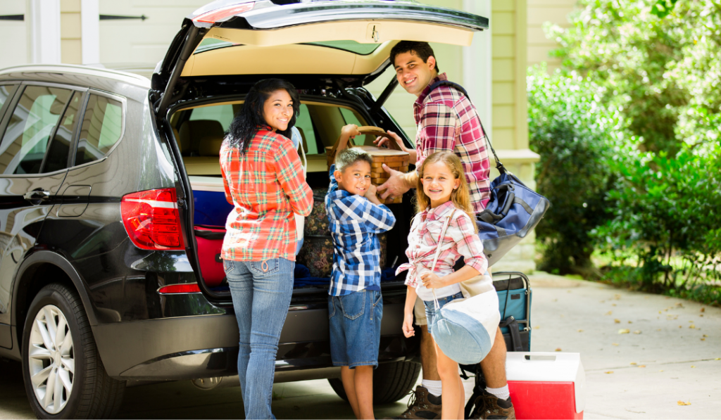 A family packing the car for an Outer Banks vacation